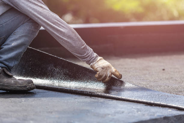 Professional Basement Waterproofing technician working in Haslett, MI